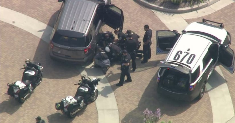 LAPD officer, homicide suspect injured after pursuit ends in gunfight ...