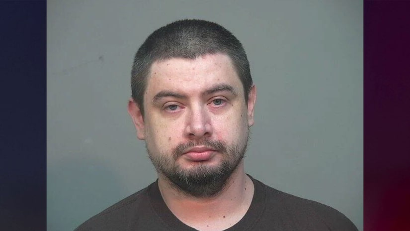 Authorities who rescued 16 children from squalid home were reportedly there to serve warrant for indecent exposure charges